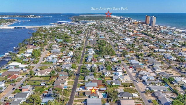 aerial view with a water view and a residential view