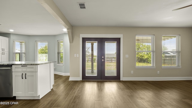 doorway to outside with a ceiling fan, visible vents, baseboards, french doors, and dark wood finished floors