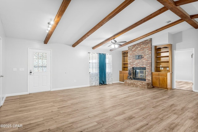 unfurnished living room with light wood finished floors, visible vents, baseboards, a brick fireplace, and ceiling fan
