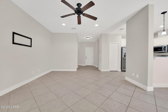 spare room with recessed lighting, light tile patterned floors, baseboards, and a ceiling fan
