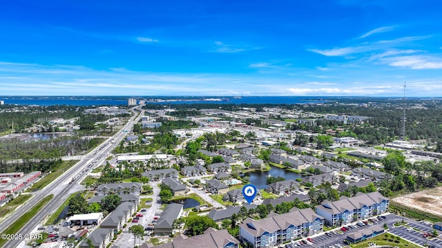 birds eye view of property with a residential view and a water view
