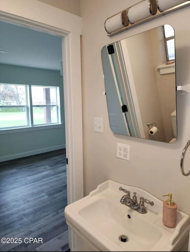 1301 New York Ave, Lynn Haven, FL 32444 - bathroom with healthy amount of natural light and wood finished floors