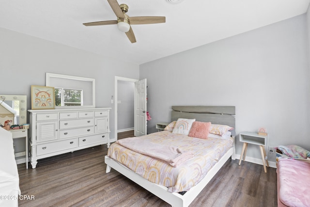 bedroom with baseboards, ceiling fan, and dark wood finished floors