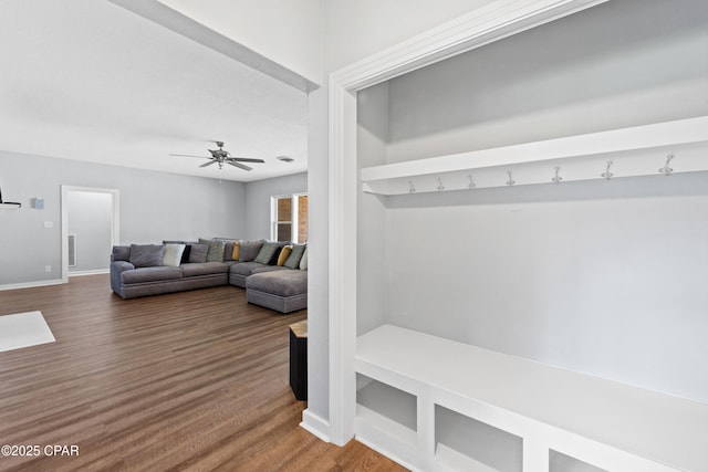 mudroom featuring wood finished floors, baseboards, and a ceiling fan