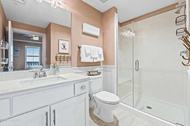 15928 Front Beach Rd Unit 3 2005, Panama City Beach, FL 32413 - bedroom featuring light wood finished floors, a decorative wall, a closet, and a ceiling fan