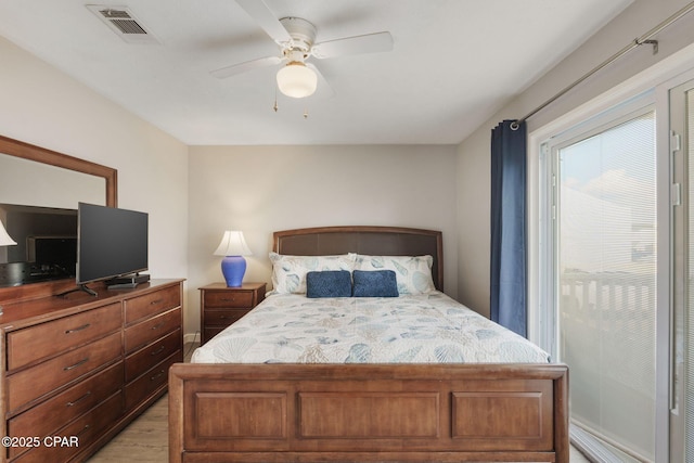 17670 Front Beach Rd Unit B8, Panama City Beach, FL 32413 - bedroom featuring a ceiling fan, light wood-style floors, and visible vents
