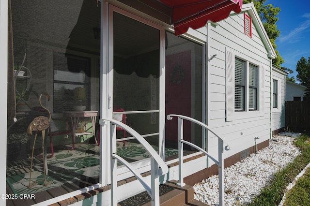 view of side of property with crawl space