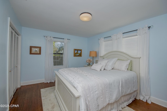 106 N Cove Blvd, Panama City, FL 32401 - bedroom featuring baseboards, wood finished floors, and a closet