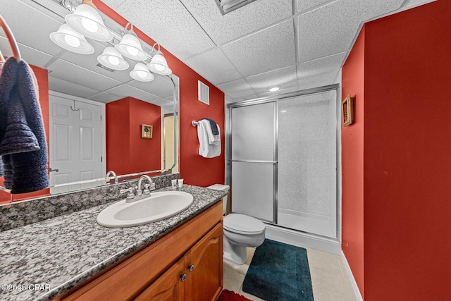 11619 Front Beach Rd Unit 201, Panama City Beach, FL 32407 - full bath featuring vanity, a stall shower, tile patterned flooring, visible vents, and a drop ceiling