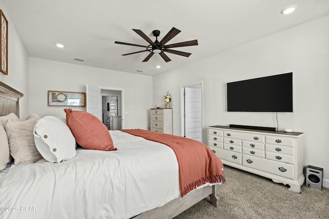 carpeted bedroom with ceiling fan, recessed lighting, and visible vents