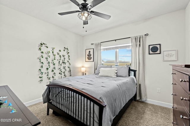 bedroom featuring carpet flooring, a ceiling fan, and baseboards