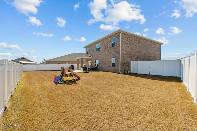 view of yard featuring a fenced backyard