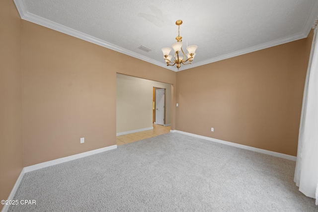unfurnished room with visible vents, baseboards, an inviting chandelier, crown molding, and light carpet