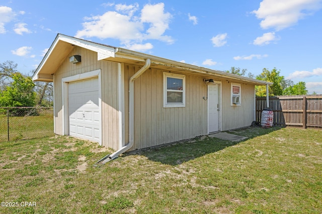 view of outbuilding with a fenced backyard and an outdoor structure