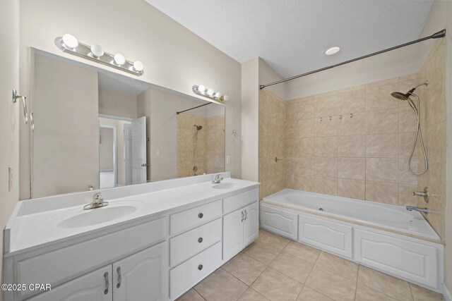 full bath with tile patterned floors, double vanity, shower / tub combination, and a sink