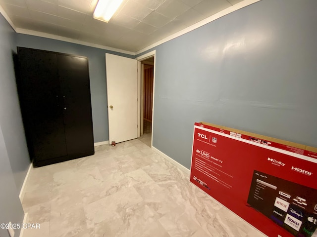 unfurnished bedroom with baseboards