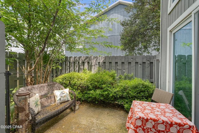 view of patio / terrace with fence