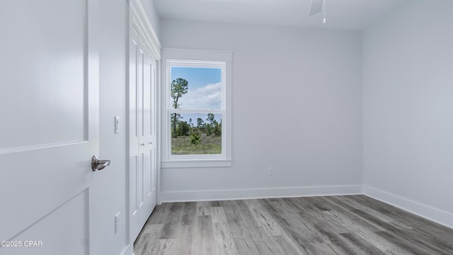 1113 New Hampshire Ave, Lynn Haven, FL 32444 - empty room featuring light wood-style floors, ceiling fan, and baseboards