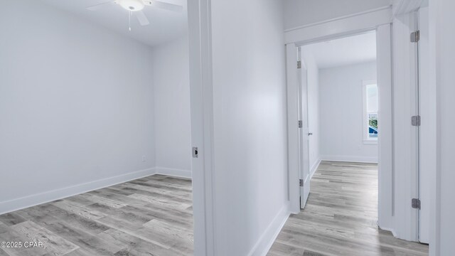 1113 New Hampshire Ave, Lynn Haven, FL 32444 - corridor with light wood-type flooring and baseboards