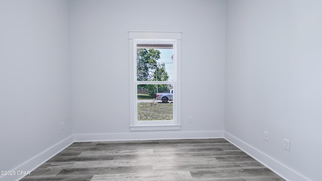 1113 New Hampshire Ave, Lynn Haven, FL 32444 - spare room with baseboards and wood finished floors