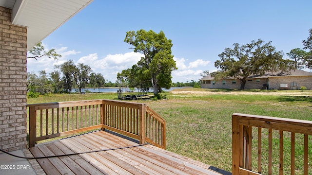 1113 New Hampshire Ave, Lynn Haven, FL 32444 - wooden deck featuring a water view and a lawn