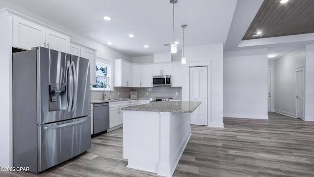 1113 New Hampshire Ave, Lynn Haven, FL 32444 - kitchen featuring white cabinetry, recessed lighting, stainless steel appliances, and a sink