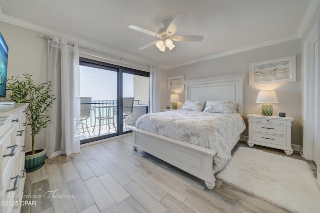 bedroom with a textured ceiling, light wood-type flooring, access to exterior, and crown molding