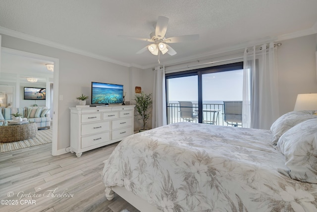 bedroom featuring a textured ceiling, ceiling fan, light wood-style flooring, ornamental molding, and access to exterior