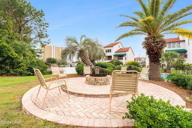 8730 Thomas Dr Unit 1311C, Panama City Beach, FL 32408 - view of patio with a fire pit