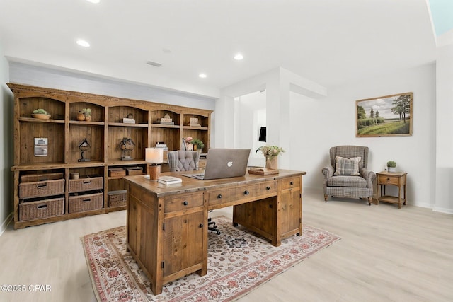 office area with light wood-type flooring, baseboards, and recessed lighting