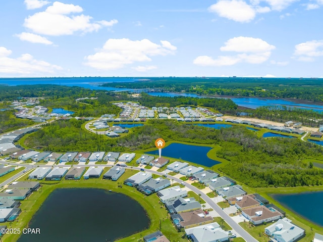 bird's eye view featuring a residential view and a water view