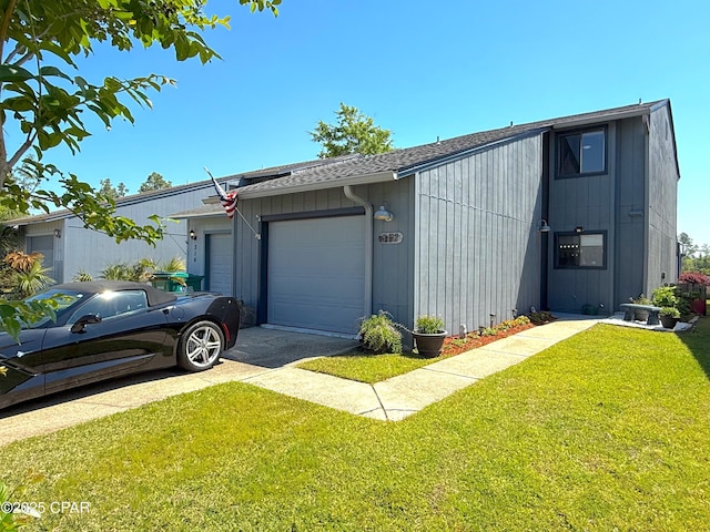 312 Sukoshi Dr, Panama City, FL 32404 - exterior space with a lawn, roof with shingles, and concrete driveway