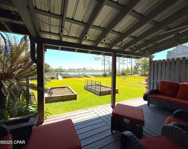 312 Sukoshi Dr, Panama City, FL 32404 - wooden terrace featuring fence, a garden, a yard, and a water view