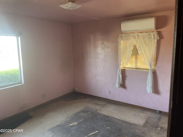 609 Bob Little Rd, Panama City, FL 32404 - empty room featuring baseboards and a wall unit AC