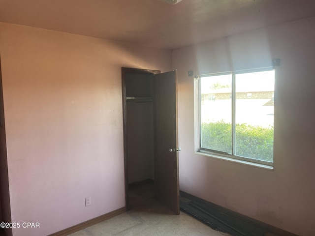 609 Bob Little Rd, Panama City, FL 32404 - unfurnished bedroom featuring multiple windows and a closet
