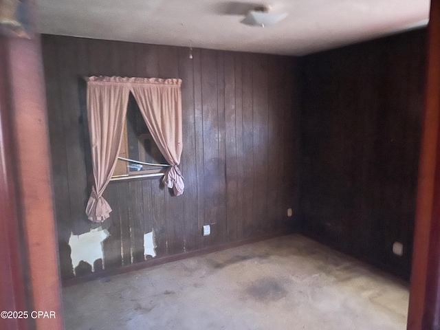 609 Bob Little Rd, Panama City, FL 32404 - carpeted spare room with wooden walls