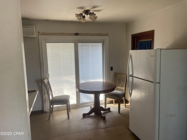 609 Bob Little Rd, Panama City, FL 32404 - dining space with baseboards and concrete floors