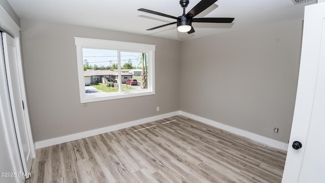 6401 Chipewa St, Panama City, FL 32404 - unfurnished bedroom with a closet, light wood-type flooring, baseboards, and ceiling fan