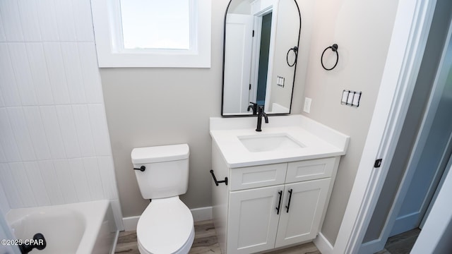6401 Chipewa St, Panama City, FL 32404 - full bathroom featuring bathtub / shower combination, vanity, baseboards, and toilet