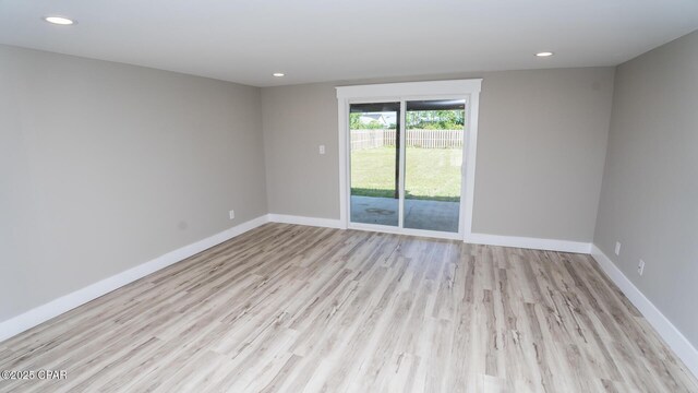 6401 Chipewa St, Panama City, FL 32404 - unfurnished room with wood finished floors, baseboards, and recessed lighting