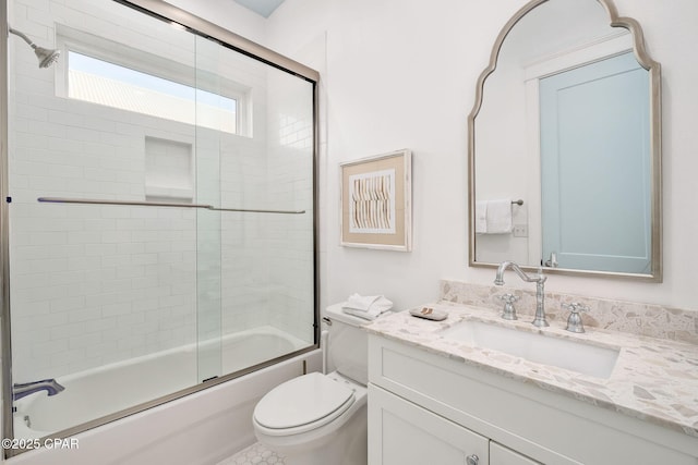 20405 Front Beach Rd, Panama City Beach, FL 32413 - bathroom with toilet, bath / shower combo with glass door, and vanity
