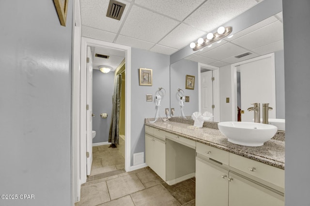 520 Richard Jackson Blvd Unit 2005, Panama City Beach, FL 32407 - bathroom with visible vents, tile patterned flooring, toilet, and vanity