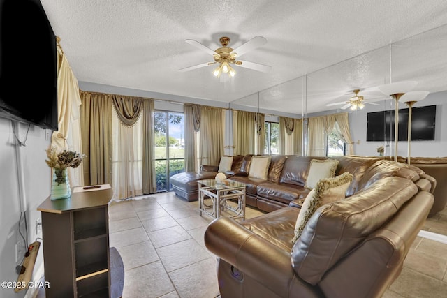520 Richard Jackson Blvd Unit 2005, Panama City Beach, FL 32407 - living room with plenty of natural light, a textured ceiling, and ceiling fan