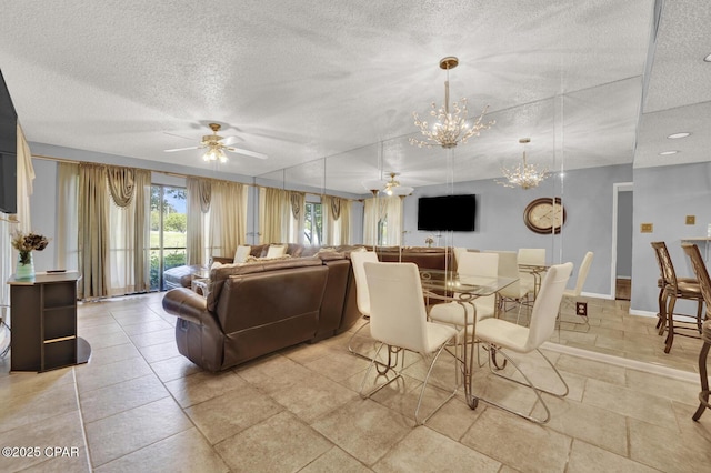 520 Richard Jackson Blvd Unit 2005, Panama City Beach, FL 32407 - living room with a textured ceiling, baseboards, and ceiling fan with notable chandelier