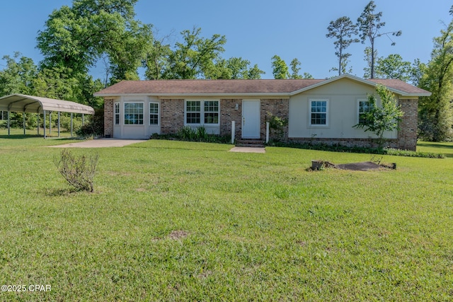 4873 Donna Dr, Marianna, FL 32446 - ranch-style home with a front yard, brick siding, and a carport