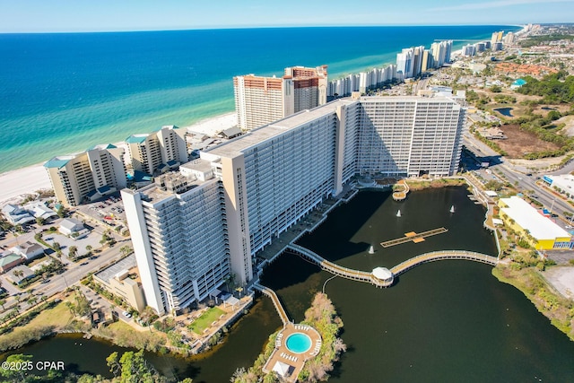 aerial view featuring a view of city and a water view