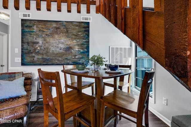 17462 Front Beach Rd Unit 33D, Panama City Beach, FL 32413 - dining room featuring baseboards, wood finished floors, and visible vents