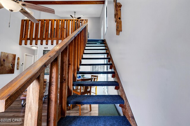 17462 Front Beach Rd Unit 33D, Panama City Beach, FL 32413 - stairs with a ceiling fan, wood finished floors, and visible vents