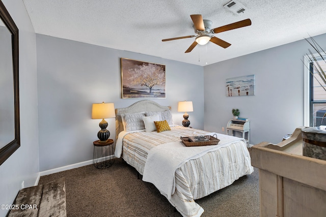 17462 Front Beach Rd Unit 33D, Panama City Beach, FL 32413 - bedroom with a ceiling fan, a textured ceiling, carpet floors, baseboards, and visible vents