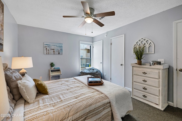 17462 Front Beach Rd Unit 33D, Panama City Beach, FL 32413 - bedroom with a textured ceiling, two closets, ceiling fan, carpet floors, and baseboards